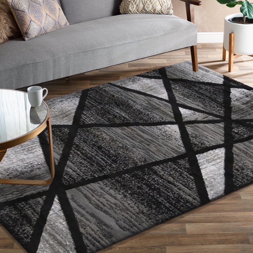 Modern szürke-fekete szőnyeg absztrakt mintával Szélesség: 160 cm | Hossz: 220 cm