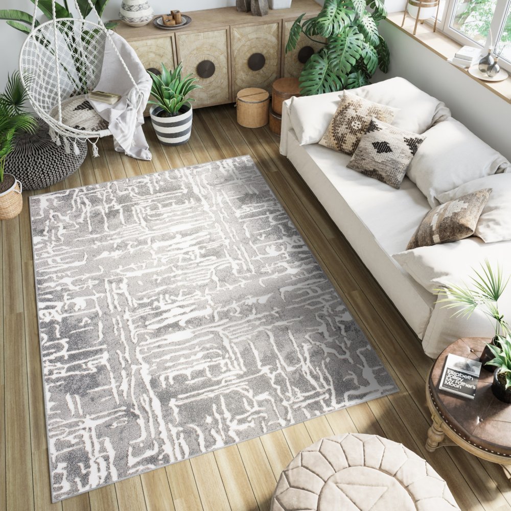 Sivý dizajnový koberec so svetlým abstraktným vzorom Šírka: 80 cm | Dĺžka: 150 cm
