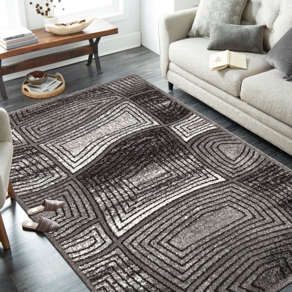 Moderní šedý koberec s abstraktním motivem Šířka: 120 cm | Délka: 170 cm