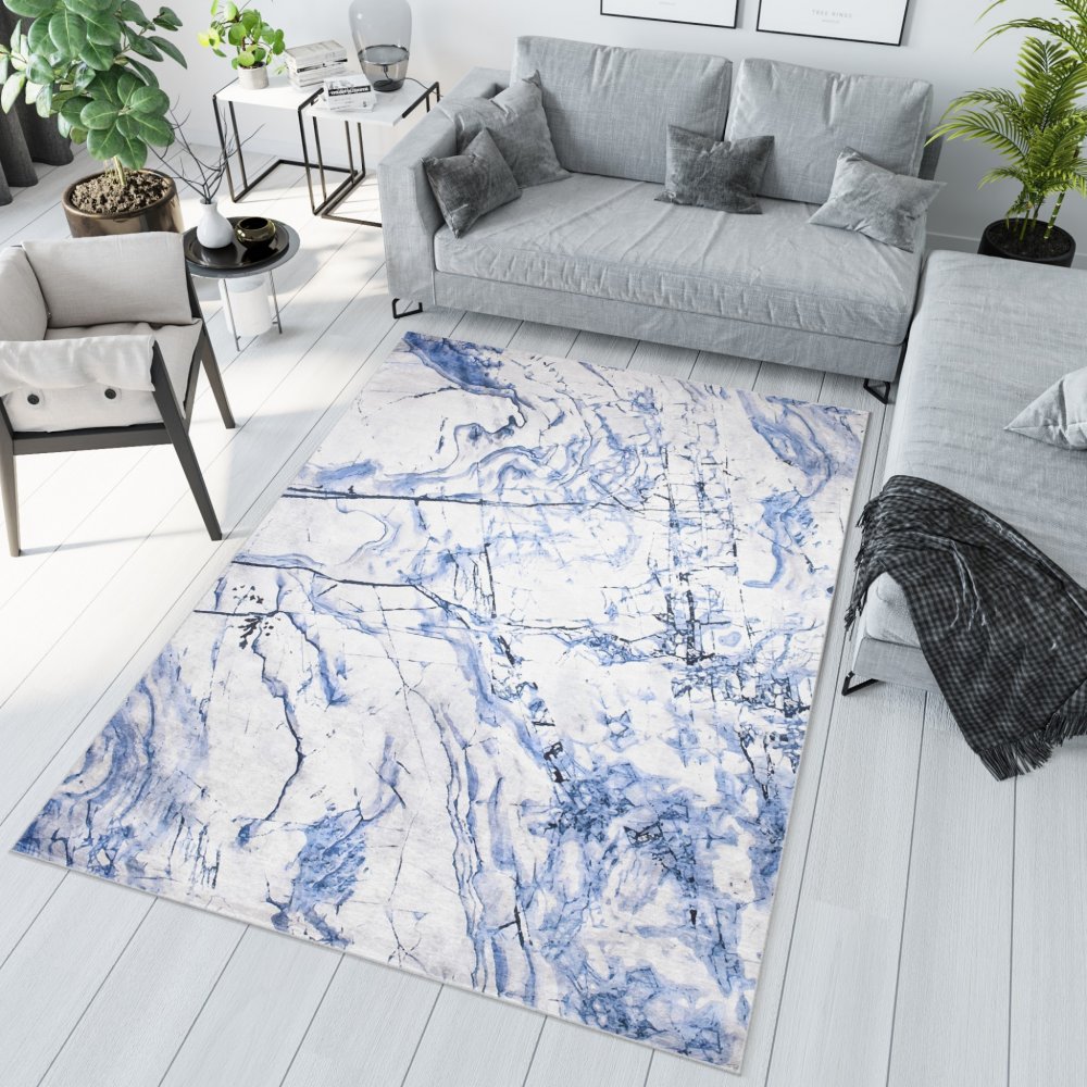 Jednoduchý bílý a modrý koberec s abstraktním vzorem Šířka: 140 cm | Délka: 200 cm