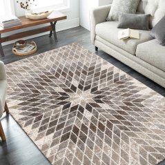 Beigefarbener Teppich in modernem Design mit natürlichen Motiven