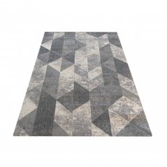 Sivi tepih s modernim uzorkom