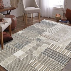 Bézs színű szőnyeg geometrikus mintákkal 