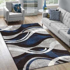 Origineller Teppich mit abstraktem Muster in blaugrauer Farbe