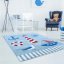 Hebký dětský koberec s námořnickým motivem modré barvy