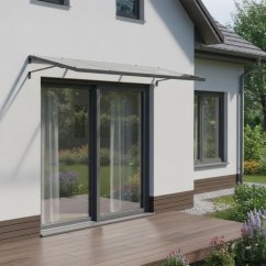 Bejárati polikarbonát előtető az ajtó felett acélszerkezettel