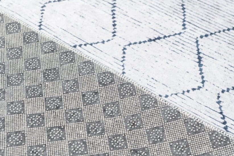 Světle šedý moderní koberec s jednoduchým vzorem