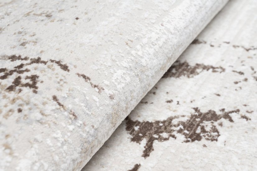 Cremefarbener Vintage-Teppich mit abstraktem Muster