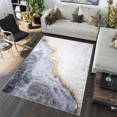 Moderný sivý koberec s abstraktným vzorom