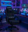 Scaun de gaming negru cu tapițerie din catifea și suport pentru picioare extensibil