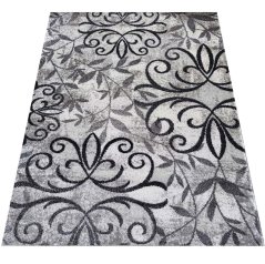 Moderner Teppich mit Blättermotiv 