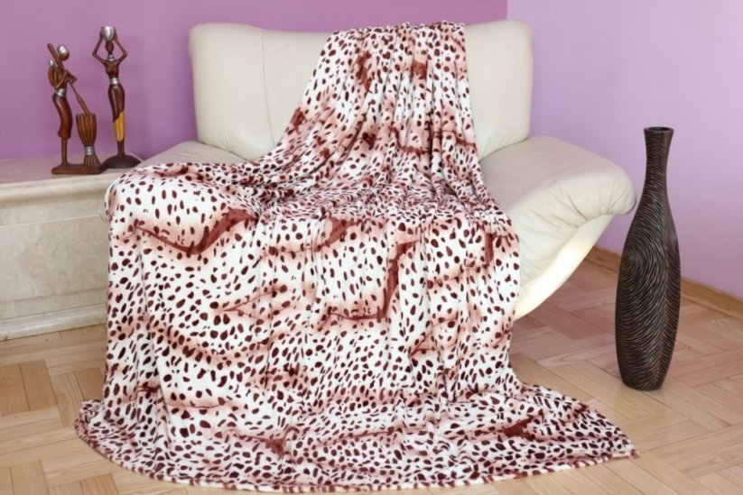 Teplá deka krémové barvy s hnědými vzory