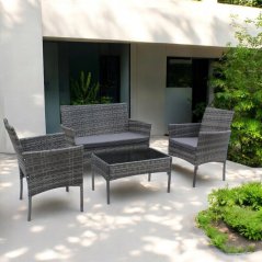Set da giardino con divano, poltrone e tavolo con vetro nero
