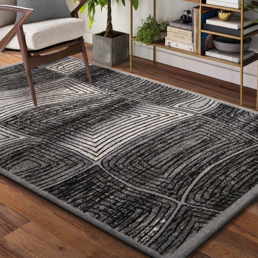 Originální šedý koberec s abstraktním vzorem