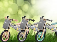 Sivý balančný bicykel s úložným vreckom