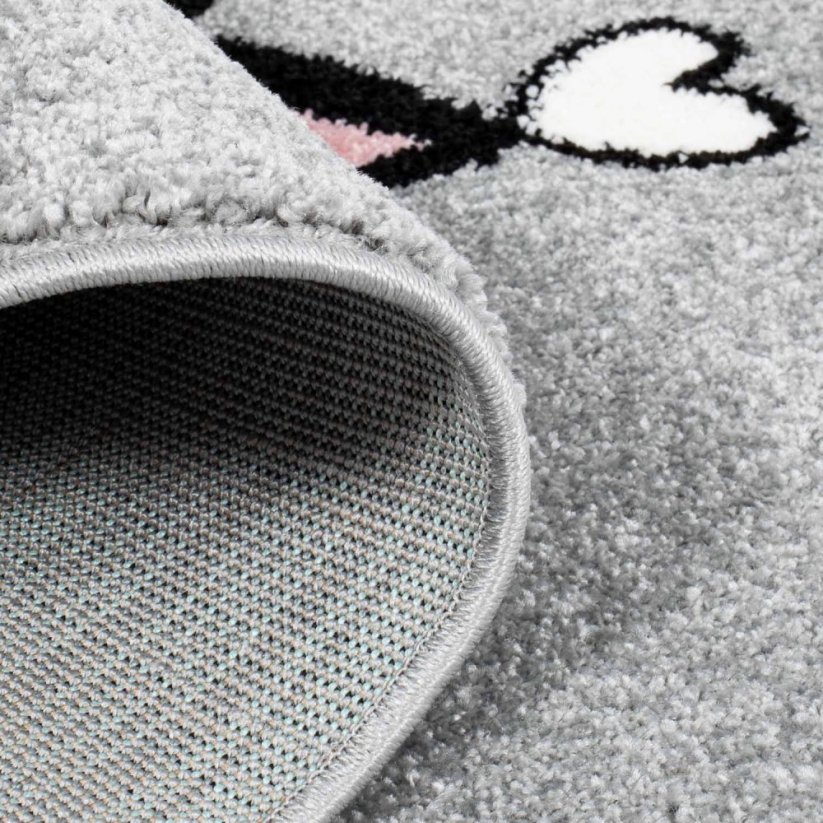 Simpatico tappeto per bambini grigio con gatto felice
