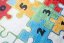 Kinderteppich mit buntem Puzzlemotiv