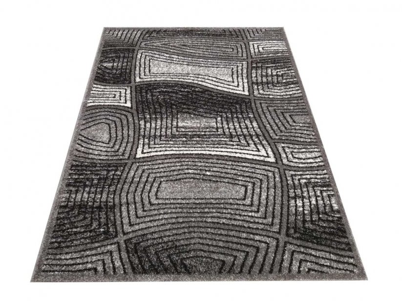 Moderný vzorovaný koberec sivej farby