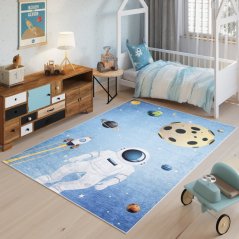 Kinderteppich mit dem Motiv von Astronauten und Planeten 