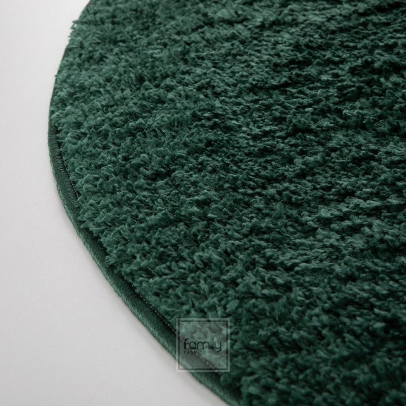 Разкошен кръгъл килим в изумрудено зелено