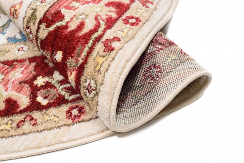 Runder cremefarbener Teppich im Vintage-Stil