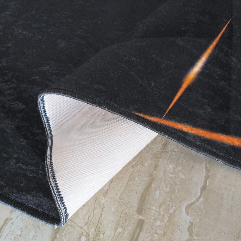 Moderner schwarzer Teppich mit abstraktem Muster