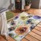 Farebný koberec s motívom pávích pierok do obývačky