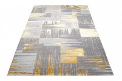 Moderan sivi tepih za dnevni boravak sa zlatnim motivom