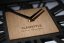 Quadratische Wanduhr aus Holz in Schwarz