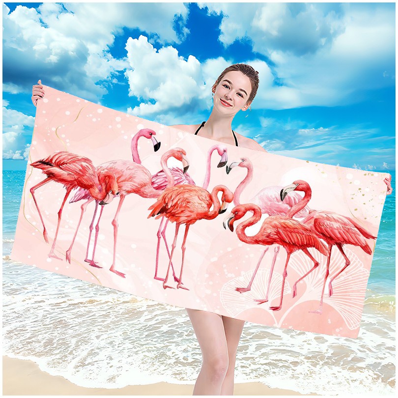 Strandtuch mit einem Motiv von wunderschönen Flamingos 100 x 180 cm