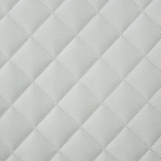 Velvet bedspread quilted in geometric pattern