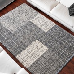 Moderní šedý koberec s jemným vzorováním