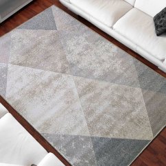 Beigefarbener Teppich mit modernem geometrischem Muster