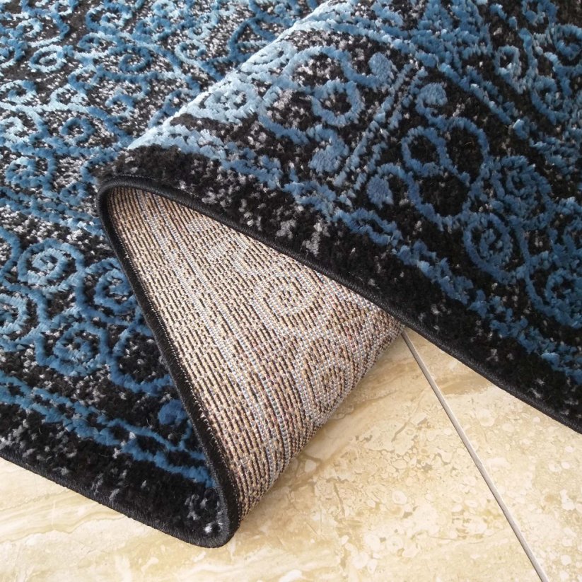 Vzorovaný koberec modrý