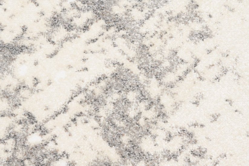 Krémový designový koberec s šedým abstraktním vzorem