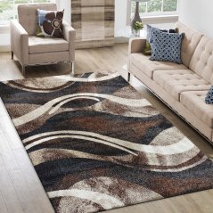 Оригинален килим с абстрактен десен в кафяв цвят