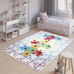 Tappeto per bambini con motivo a puzzle colorato 