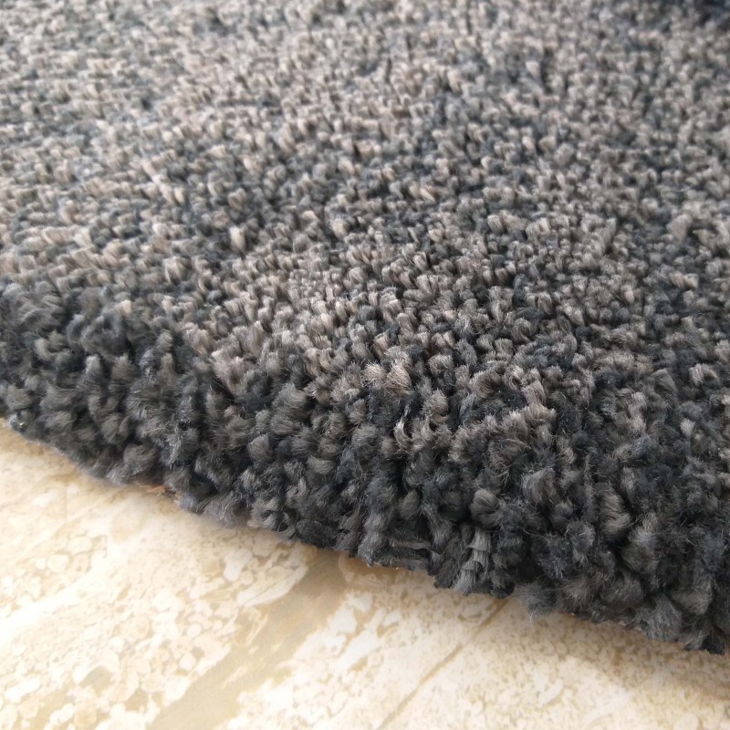 Moderni okrugli tepih u crnoj boji
