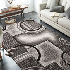 Модерен сиво-кафяв килим с абстрактни кръгове
