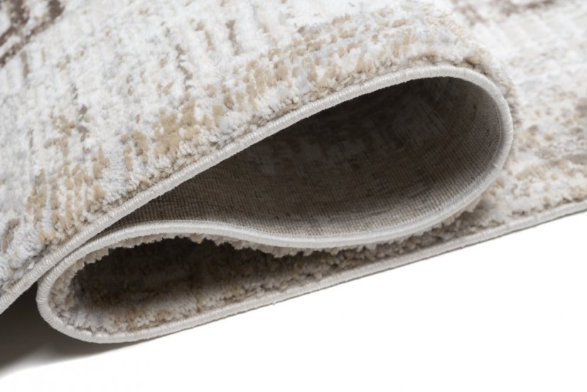 Dizajnový vintage koberec s geometrickým vzorom