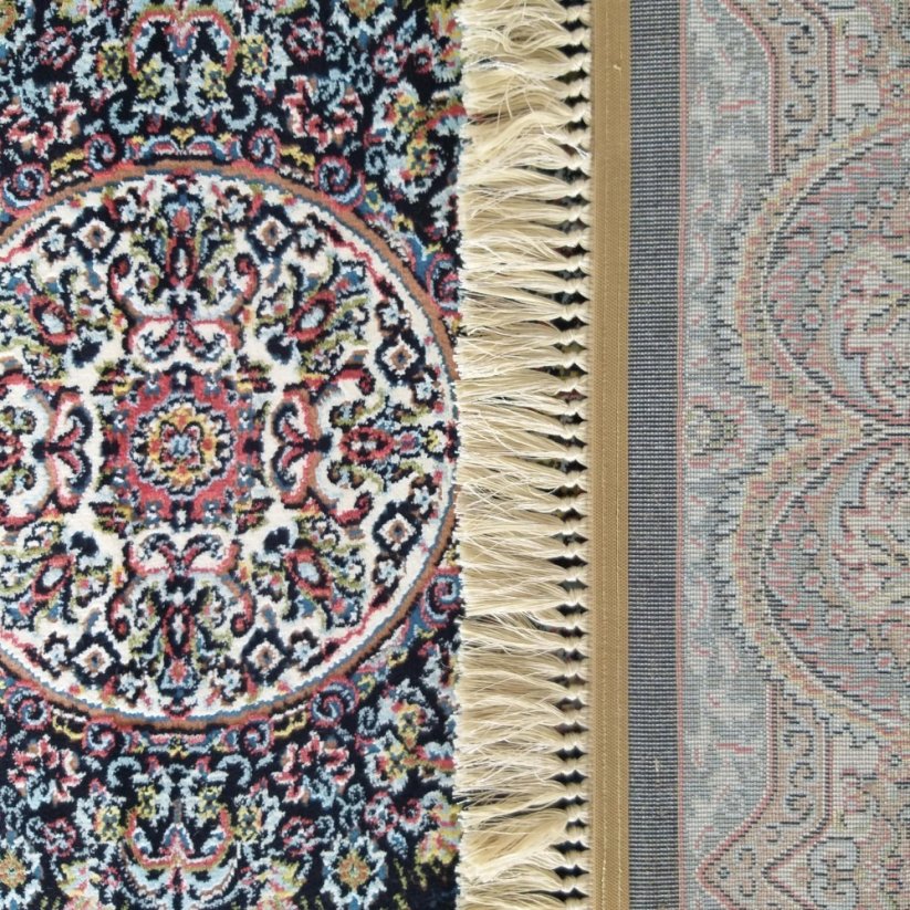 Esclusivo tappeto blu con splendidi dettagli colorati