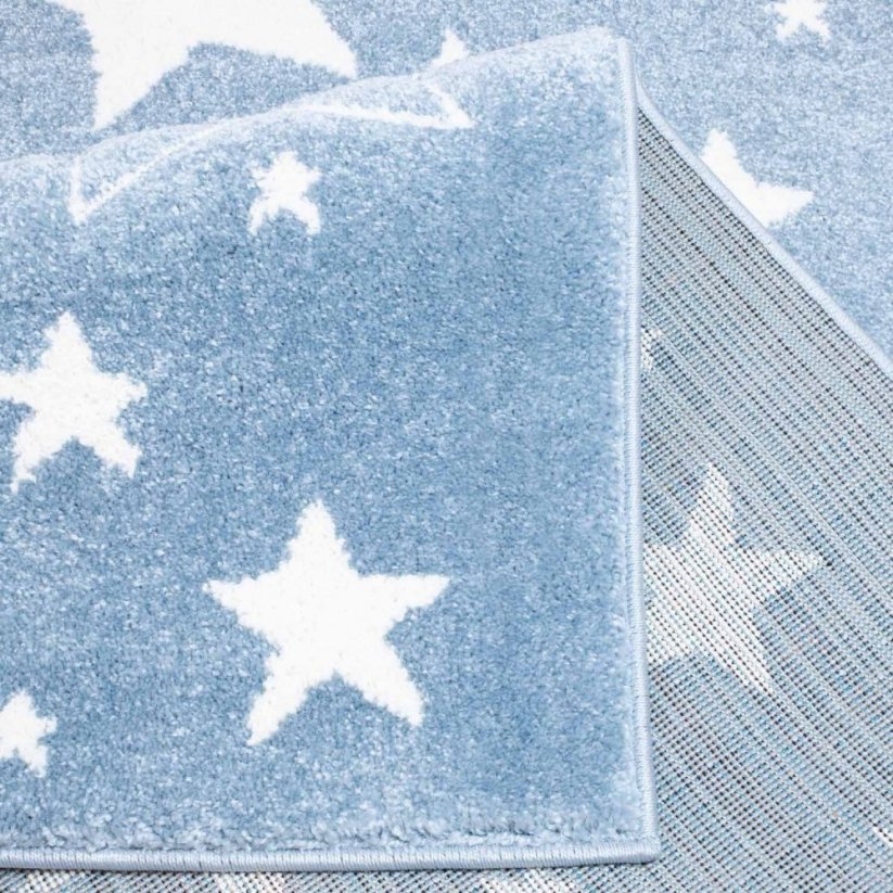 Originálny detský koberec modrej farby s hviezdičkami