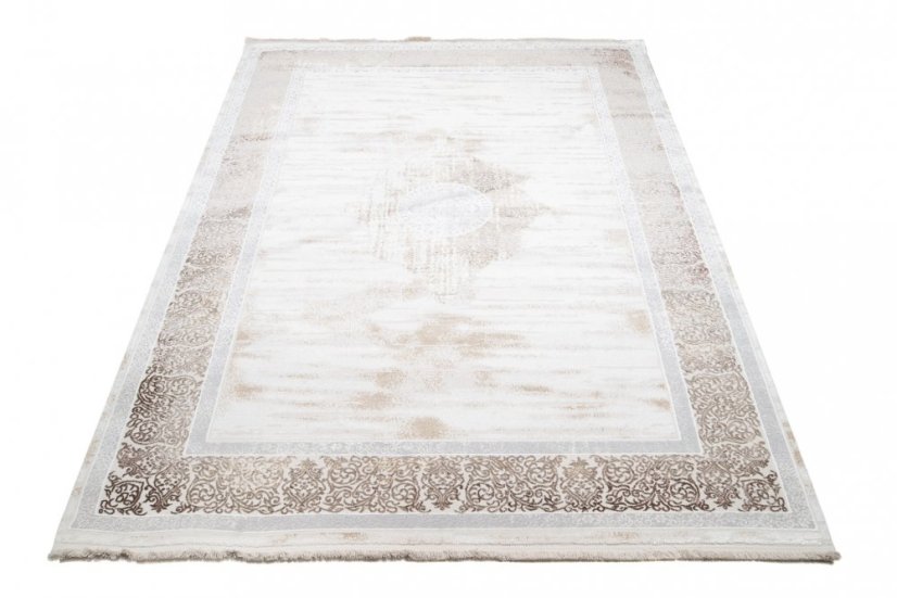 Jemný krémový koberec s ornamentami