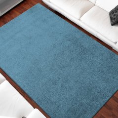 Štýlový jednofarebný koberec shaggy modrej farby