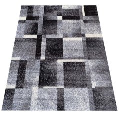 Koberec s geometrickými vzory v šedé barvě
