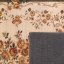Zelený vintage koberec s kvetinovým motívom