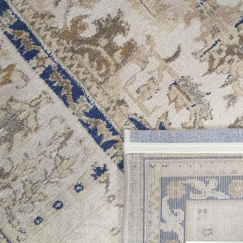 Schöner Vintage-Teppich in Beige mit blauem Muster