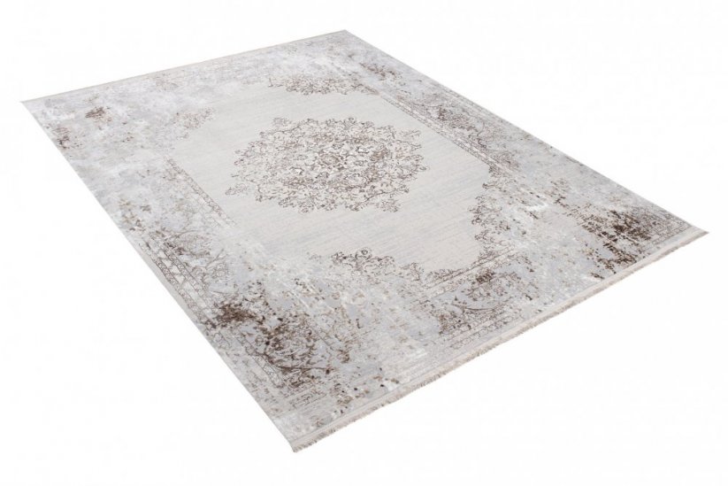 Svijetlo krem sivi tepih vintage dizajna s uzorcima