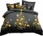 Božićna posteljina s motivom zlatne jelke