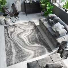 Sötét szürke design szőnyeg absztrakt mintával